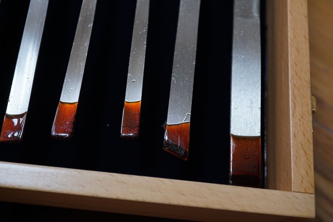 Three sets of Henry Taylor Tools Limited of Sheffield, wood carving chisels, comprising of a 12-carving chisel set contained within a fitted beech case, a set of 17 skew gouges in a fitted card case, and a set of 12 micr